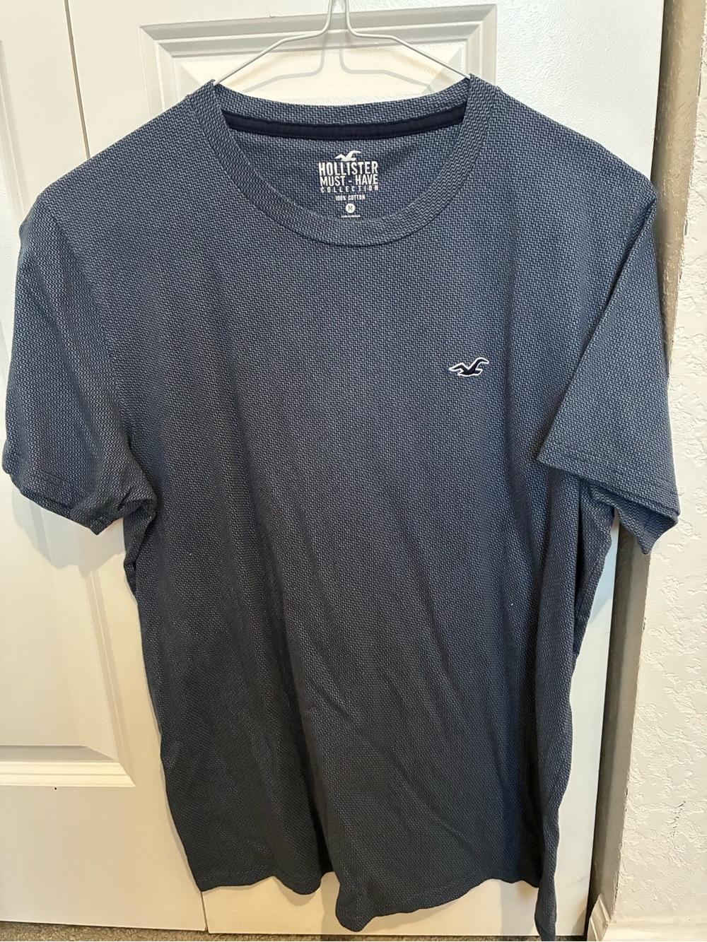 Hollister Men's Textured Navy Short Sleeve Tee with Chest Logo